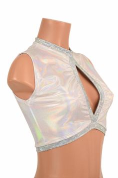 "This item is made to order, please read all the way through the listing before purchasing! This crop top is made from four way stretch lycra spandex in Flashbulb Holographic. Frostbite Shattered Glass fabric accents around the middle opening, neckline, and hemline. It features a keyhole design in front, with a high back, and fits like a glove! TOP LENGTH: Underarm to hemline measures 8\" Womens Sizing (See below for instructions on where measurements should be taken) XXS: Bust 29\"-30\" / Waist White Stretch Tank Top For Club, Fitted Tank Vest For Club, Fitted Party Vest Crop Top, Rave Sleeveless Tops For Club, Sleeveless Rave Tops For Club, Stretch Sleeveless Rave Tops, Sleeveless Stretch Rave Tops, Fitted Vest Top For Festival, Fitted Vest Top For Club