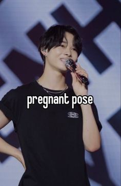 a person holding a microphone up to their mouth with the words pregnant pose in front of them