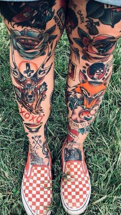 the legs and ankles of a person with tattoos on them, both wearing checkered shoes