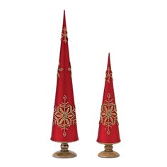 two red cones with gold decorations on them