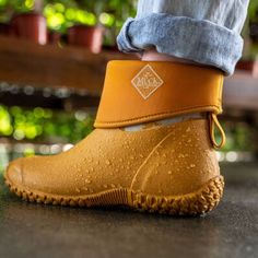 Muck Women's Muckster II Mid Waterproof Ankle Work Boot -Yellow- WM28FRM On Sale Now! This Item Ships FREE! Stay dry and comfortable in the Muckster II collection, ideal for any chore or task. These beloved classics offer rubber outsoles that are designed to easily shed debris and provide great multi-surface traction. Whether you are in the garden, running errands, or walking the dog, you’ll enjoy these easy-on/easy-off staples for every outdoor enthusiast. This collection offers three different Gardening Fashion, Steel Toe Boots, Boot Companies, Muck Boots, Mid Boots, Outdoor Enthusiast, Work Boot, Wide Calf Boots, Wide Boots