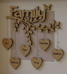 a family tree with hearts hanging from it