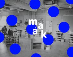 an image of blue balls in the middle of a room with words ma ak on it