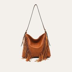 Discover Elegant Style and Functionality Embrace the perfect blend of fashion and practicality with our Luxurious Vegan Leather Tassel Shoulder Bag. Designed for the modern woman, this versatile hobo crossbody handbag is a must-have accessory for any wardrobe. Made from high-quality PU vegan leather, this bag is not only stylish but also ethically conscious. The elegant tassel decoration adds a bohemian touch, making it ideal for both casual and formal occasions. Key Features Material: High-grade PU Vegan Leather Spacious Interior: Includes a zipper pocket and a slot pocket Convenient Exterior: Features a back zipper pocket for easy access Secure Closure: Reliable zipper to keep your belongings safe Single Shoulder Strap: For comfortable carrying as a shoulder or crossbody bag Size: Genero Fall Hobo Bag With Adjustable Strap For On-the-go, Fall Crossbody Bucket Bag, Trendy Hobo Bag For On-the-go, Bucket Shoulder Bag For On-the-go Fall Season, Fall Hobo Bag With Adjustable Strap For Errands, Chic Brown Fringe Hobo Bag, Versatile Fall Bucket Hobo Bag, Chic Travel Hobo Bag With Fringe, Chic Fringe Hobo Bag For Travel