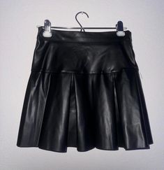 Womens Fashion Nova Super Cute Mini Skirt Size Small Faux Leather. Fits More Like A Medium Or A Tight Small. Adds So Much Flavor To Any Closet And Matches Perfectly With Any Cute Pieces. This Mini Skirt Fits Just Right For Anyone Looking To Explore Any New Styles. Perfect For Going Out, Dressing Up, Or For Casual Wear. Goes Perfectly With A Simple Top, Leggings, And Some Cute Shoes. Measurements: Waist : 14", Length : 14.5". Materials: Coating : Polyurethane, Fabric : 100% Polyester, Lining : 100% Polyester. Made In China. Tags: Skater Goth Girl Egalitarian Victorian Fashion Forward Style Designer Clothing Going Out Party Club. Black High Waist Non-stretch Mini Skirt, Micro Mini Skirt Black, Black Pleated Full Mini Skirt, Black Non-stretch Mini Skirt, Black A-line Mini Skirt With Lining, Simple Top, Skirt Fits, Victorian Fashion, Fashion Nova