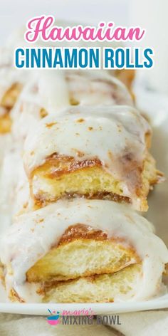 cinnamon rolls on a white plate with the title above it in pink and blue text reads hawaiian cinnamon rolls