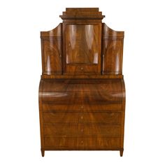 an antique wooden desk with mirror on it's top and drawers below the drawer