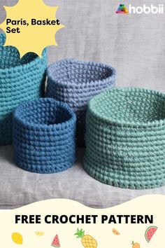 three crochet baskets sitting on top of a table