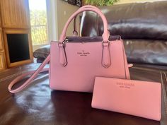 Beautiful gently used Kate Spade purse and wallet. The purse can be used as an either crossbody or a tote. Both pieces are in very good condition. Really nice pink color for spring or summer! Purse is roomy without being bulky - the compartments make for easy organization. Wallet is slimline and fits in purse nicely. Kate Spade Purse Outfit, Pink Kate Spade Purse, Pink Purses, Kate Spade Purse Pink, Summer Purse, Purse Outfit, Pink Kate Spade, Christmas List Ideas, Girly Bags