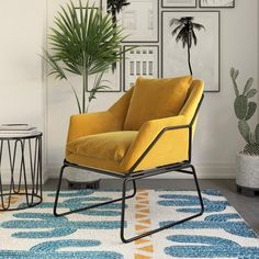 a yellow chair sitting on top of a rug next to a potted palm tree