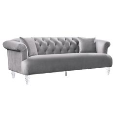 The Armen Living Elegance contemporary sofa is a great piece for the modern household. Part of the Elegance collection, this beautiful living room sofa features acrylic legs that assure durability without compromising on style. Pair the Elegance couch with the accompanying loveseat and chair to create a more cohesive living room look. The Elegance sofa is available in grey velvet. Armen Living Elegance 88-in Modern Grey Velvet 3-seater Sofa in Gray | LCEG3GR Wooden Frame Sofa, Grey Velvet Sofa, Traditional Sofa, Acrylic Legs, Mid Century Sofa, Beautiful Sofas, Tufted Sofa, Sofa Frame, Wooden Sofa