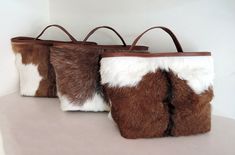 "BROWN AND WHITE Cowhide Bag. Cowhide Purse, Calf Hair Bag, Pony Hair bag, Brown Leather Bag, Crossbody Bags for Women, Sling Bag, Furry Bag. Patty Bag. The Patty bag is a gorgeous furry piece that will be loved with each use. Front, back and bottom in hide hair, completely covered! Super chic elegance. Leather short arm strap & long adjustable/ detachable strap. Wear it cross body or over arm. Will carry all your small buys through the day too. Lining cotton drill with inside zip pocket. Mu White Sling Bag, Cowhide Clutch, Women Sling Bag, Hair Bag, Adjustable Bag Strap, Cowhide Purse, Hidden Colors, Cowhide Handbags, Leather Factory