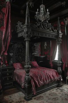 an ornate bed in a dark room with red drapes on the windowsills