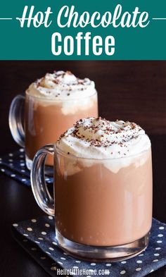 two mugs filled with hot chocolate and whipped cream