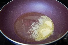 some food is cooking in a pan on top of the stove and it looks like something out of space