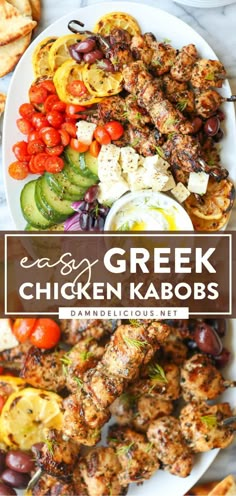 greek chicken kabobs with tomatoes, cucumbers and olives on a white plate