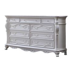 an antique white dresser with drawers and knobs on the top, against a white background