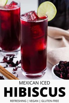 the mexican iced hibiscus is garnished with lime and served with cinnamon