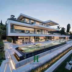 a large modern house with an outdoor swimming pool