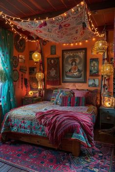 a bedroom decorated in bohemian style with lights strung from the ceiling and colorful bedding