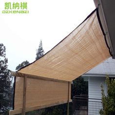 an outdoor area with a large wooden awning