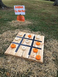 a wooden board game with pumpkins on it