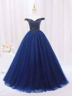 Blue Sequined Evening Ball Gown, Blue Tulle Ball Gown For Homecoming, Blue Tulle Dress For Party, Blue Tulle Gown For Homecoming, Blue Tulle Party Dress, Blue Embellished Ball Gown Evening Dress, Royal Blue Prom Dress For Party Season, Royal Blue Dress For Prom And Party Season, Blue Tulle Gown With Sequins