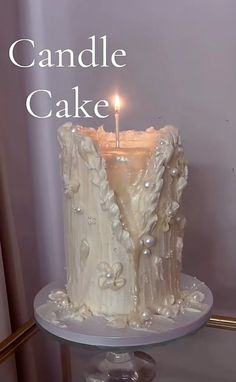 there is a candle that is on top of a cake with the words candle cake