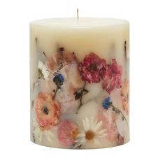 an image of a candle with flowers on it