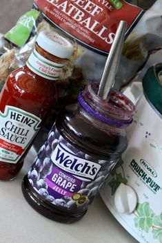 some condiments are sitting on a table