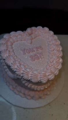 a heart shaped cake on a white plate