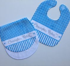 This listing is for a personalized Baby Bib/Burp Cloth set. This super-soft Baby Bib with Velcro closure is made of 100% ultra-smooth Sheared Micro Velour polyester that reverses to 100% cotton terry loops. The design and custom name is permanently printed into the fabric and will not wash or peel off. Measures 10″ x 13″ and the edges are finished with a binding. It's no secret that babies can be messy sometimes so we have just the thing to clean up that mess and keep your clothes protected! This burp cloth measures 10″ x 20″ and features a peanut shape for a comfortable fit on a shoulder and edges finished with binding. It's made from ultra-smooth sheared micro velour polyester and reverses to 100% cotton terry loops.  It is personalized with your special baby's name and is made to coordi Cheap Customizable Bib For Gifts, Cute Blue Bib For Playtime, Baby Accessories Bandanas & Bibs, Baby Photo Frames, Blue Cotton Machine Washable Bib, Personalized Burp Cloth, Burp Cloth Set, Personalized Baby Blankets