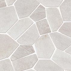 a close up view of a white and gray stone flooring pattern that looks like hexagonal tiles