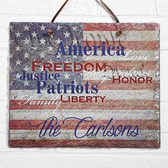 an american flag hanging on a wall with the words, america and the word liberty written in different languages