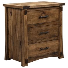 a wooden chest with three drawers on one side