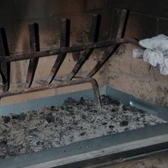 an old oven with some dirt on the floor