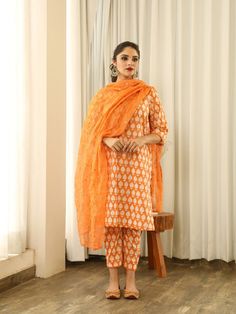 Anita - Orange Mirror Embroidered Printed Kurta Set (Set of 3) By Gulabo Jaipur now available at Trendroots Orange Chikankari Embroidery Palazzo Set For Diwali, Diwali Orange Chikankari Embroidery Palazzo Set, Designer Orange Straight Kurta, Designer Wear Orange Kurta, Navratri Orange Chikankari Palazzo Set, Traditional Drape Cotton Palazzo Set, Festive Straight Kurta Churidar With Block Print, Festive Cotton Silk Kurta With Bandhani Print, Cotton Silk Salwar Kameez With Gota Work