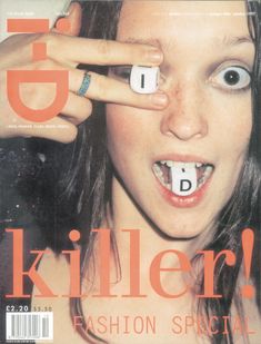 a magazine cover with a woman holding up her fingers to her eye and the words killer written on it