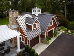 an aerial view of a house with a covered patio