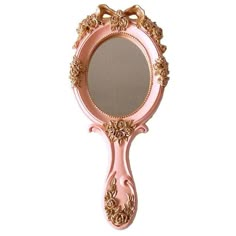 an ornate pink mirror with gold trimmings on the edges and sides, is shown against a white background