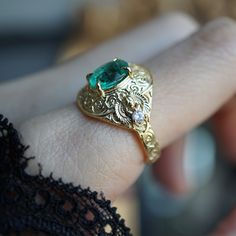 Introducing the "Emerald Scarab Ring" – a captivating blend of ancient Egyptian mystique and timeless elegance. Centered with a lush emerald framed by intricate Islamic patterns inspired by Egypt's architectural wonders, this ring evokes the opulence of ancient Egypt. Flanked by scarabs symbolizing rebirth, each holds a radiant diamond, echoing the sun's eternal sparkle on the Nile's waters. All orders come in our Tippy Taste ring box. This ring is handmade and designed in NYC. 14K or 18K solid Ancient Wedding Rings, Scarab Ring, Egypt Jewelry, Sun Ring, Egyptian Necklace, Pretty Engagement Rings, Heirloom Jewelry, Islamic Patterns, Heirlooms Jewelry