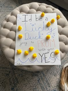 a sign that says i'd be a lucky ducky going to prom with you yes