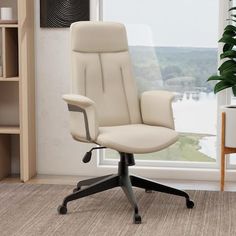 an office chair sitting in front of a window with a plant on the floor next to it