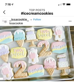 some ice cream cookies that are on a tray with the words two sweet written in them