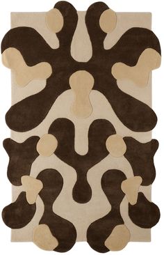 a brown and white rug with an abstract design on the bottom, in front of a white background