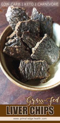 a bowl full of grass - fed livers on top of a wooden table with the title low carb keto carnivore