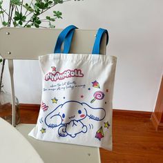 Step into a world of adorable charm with our Kawaii Cartoon Sanrio Character Print Tote Bag, the ultimate accessory for any anime enthusiast or lover of all things cute. This canvas bag features vibrant and delightful Sanrio characters that will bring joy to your everyday errands, making it not just a tote but a statement piece that stands out in any crowd.