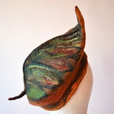 A Unique, handmade French leaf beret. I have created with wool a leaf shape beret in tones of red, brown, yellow, green and orange, cinnamon merino wool. To add texture I used silk and fibers.  I have machine stitched around the brim ♥This Hat is ready to ship. Every hat I make is a unique piece, therefore, if I make more than one of the same design yours will be unique in itself, because it is hand-made. Your hat will, of course, be very close to the original in the photograph, so you can be as Handmade Felt Hats, Costume Unique, Felt Beret, Wood Elf, Hat Handmade, Winter Cap, Wool Winter, Winter Hats For Women, Unique Gifts For Her