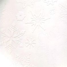 a white plate with snowflakes on it