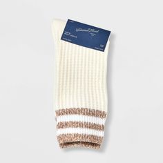 Keep your feet warm with the Women's Varsity Striped Waffle Knit Supersoft Crew Boot Socks - Universal Thread™ 4-10. These ultra soft socks are made from polyester and a hint of spandex, ensure maximum comfort and warmth. Ribbed knit cuffs provide a secure, snug fit that stays in place all day. They are perfect for lounging at home or for pairing with boots. These essential socks are a seasonless staple for every wardrobe. Auden™: Fit for you in every way. Soft Beige Socks For Fall, Comfortable Warm Cream Socks, Warm Comfortable Cream Socks, White Thick Casual Socks, Casual Thick White Socks, Super Soft Comfortable Cream Socks, Comfortable Cream Socks For Fall, Comfortable Super Soft Cream Socks, Soft Cream Casual Socks